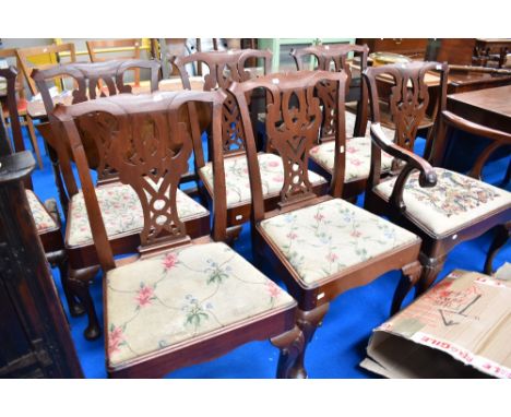 A set of seven (six plus one) George III mahogany dining chairs on the Chippendale style with drop in woolwork seats.&nbsp; S