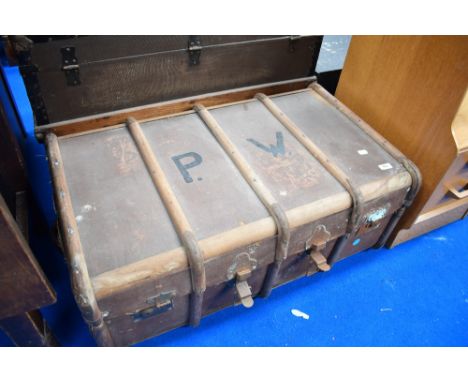 A vintage travel trunk, having initials to lid, PW
