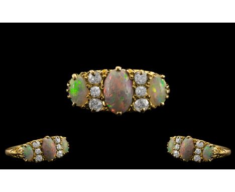 Edwardian Period Attractive and Superb Quality 18ct Gold Opal and Diamond Set Ring - Gallery Setting. The Three Oval Shaped O