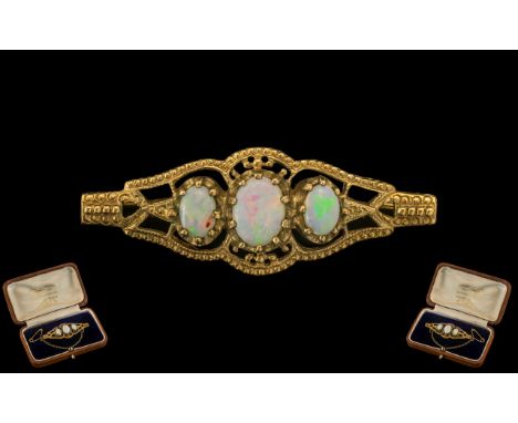 Antique Style 9ct Gold Attractive Opal Set Ornate Brooch with Attached Safety Chain. The Opals of Good Colour. Low Estimate. 