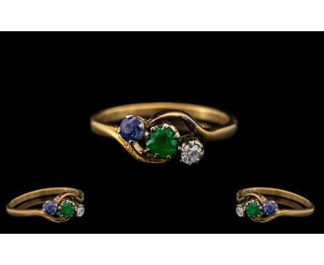 18ct Gold - Attractive Trio of Diamond, Emerald and Sapphire Set Dress Ring. Marked 18ct to Interior of Shank. The Central Em