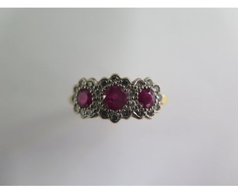 A hallmarked 18ct yellow gold ruby and diamond ring, the centre ruby approx 3.5mmx 2.5mm, ring size N, minor abrasions but in