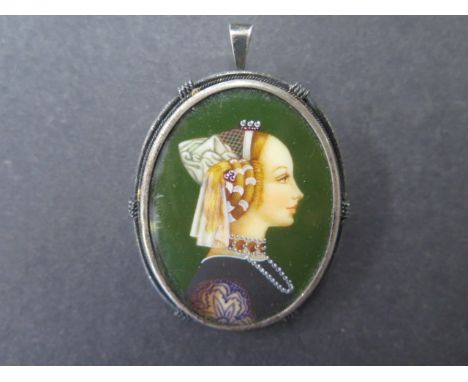 A framed white metal miniature hand painted portrait brooch pendant, signed to left, 5cm x 3cm 