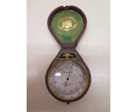 A Pillisher compensated pocket barometer, 5cm diameter, in original case, working when tested 