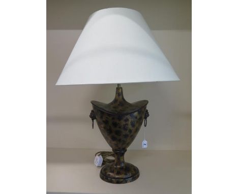 A decorative urn shaped table lamp in working order, 67cm tall, shade 50cm diameter 