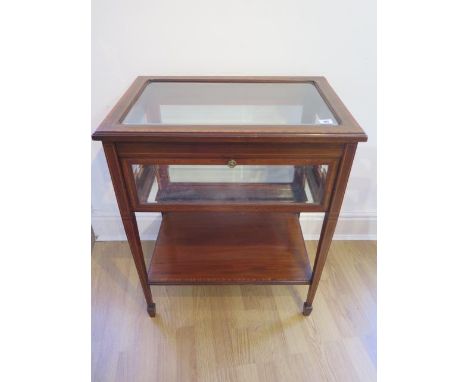 An Edwardian inlaid mahogany bijouterie display table with a drop down door, in generally good condition, 78cm tall x 64cm x 