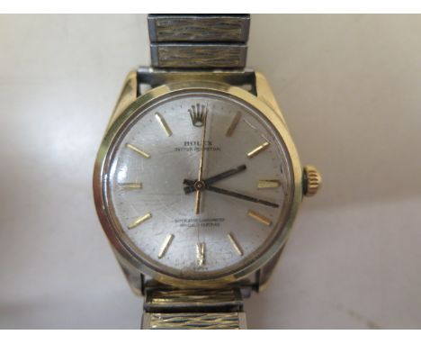 A Rolex 9ct gold Oyster perpetual superlative chronometer wristwatch, model 1002, case number 1339294, 34mm case, running but
