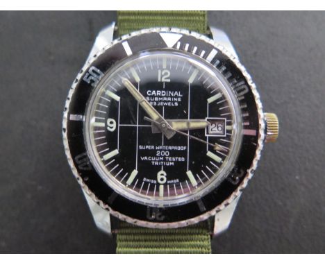 A Cardinal Submarine 23 jewel manual wind wristwatch with date and rotating bezel, 38mm case on a cloth strap, some usage mar