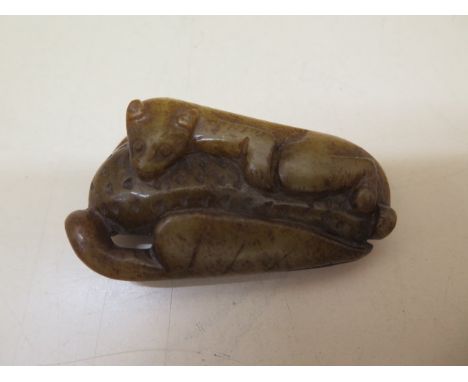 A Chinese 19th century jade carving of a tree squirrel, 7cm x 4cm, in good condition, a Chinese 19th century hard stone penda