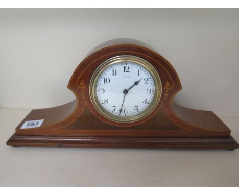A mahogany case 8 day inlaid French mantle clock, 16cm tall, small crack to dial but case good and running 