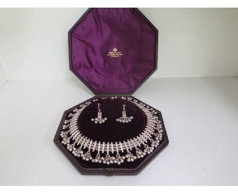 An Indo-Persian design white metal silver necklace earring set retailed by Hunt &amp; Roskell late Storr &amp; Mortimer Londo