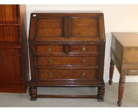 A fall front writing bureau with fitted interior, approximately 107 cm x 92 cm x 50 cm

This item must be paid for and collec