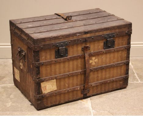 An early Louis Vuitton Rayee canvas steamer trunk, circa 1872-1876, No.8479, the hinged cover opening to reveal two removable
