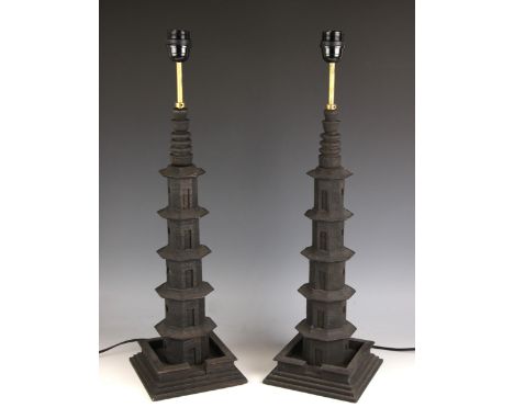 A pair of 'temple' table lamps, probably Oka, each of tapering pagoda form, upon an integral stepped plinth base, with cylind