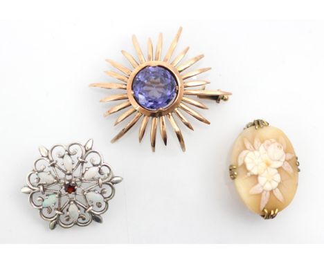 A selection of yellow metal jewellery, including a suite of amethyst coloured stone set jewellery, comprising stylised flower