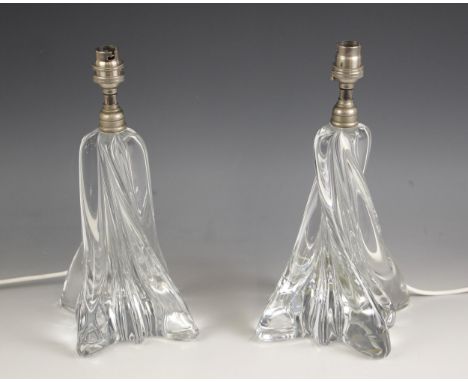 A pair of Baccarat glass table lamps, 20th century, of wrythen form, with etched maker's mark to base, each 31cm high includi