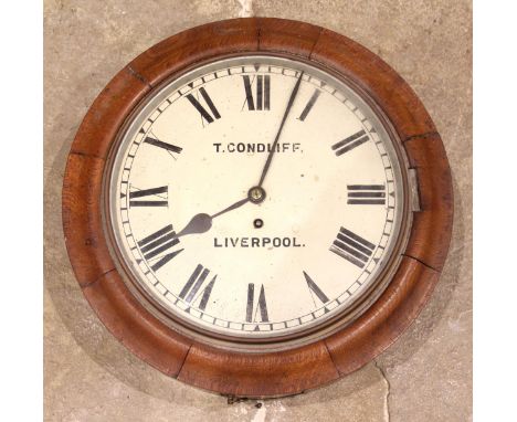 A Victorian oak cased fusee wall clock by T.Condliff, Liverpool, the 29cm painted dial applied with Roman numerals, enclosing