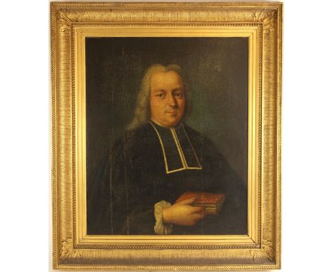 English school (19th century),A half length portrait of a clergyman,Oil on canvas,Unsigned,70.5cm x 57.5cm,Gilt framed (at fa