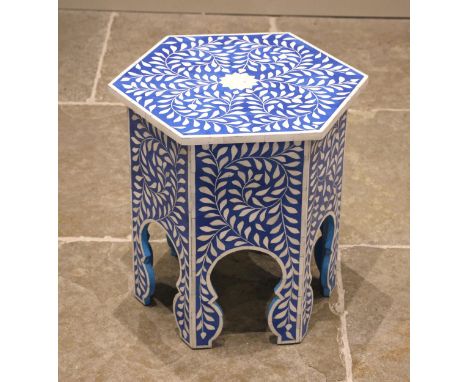 A Graham &amp; Green Indian style hexagonal lamp/occasional table, the bone inlaid trailing foliate design upon a blue ground