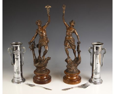 A pair of Art Nouveau chrome plated cylindrical twin-handled vases, upon a spreading circular foot, stamped to the base 'Beld
