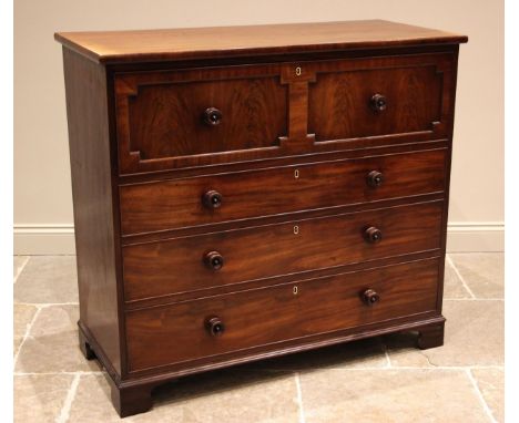 A Victorian mahogany secretaire chest of drawers, the fall front drawer with geometric moulding opening to a compartmented in