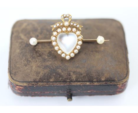 A 19th century style untested moonstone and split pearl brooch, the heart shaped 'moonstone' within surround of split pearls 
