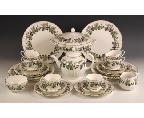 A Royal Worcester part dinner service, in the 'Lavinia' pattern, 20th century, comprising: a teapot and cover, a twin handled