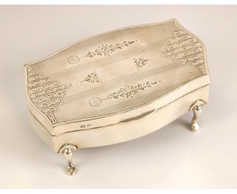 A George V silver jewellery box, Charles S Green and Co Ltd, Birmingham 1927, the shaped florally engraved and engine turned 