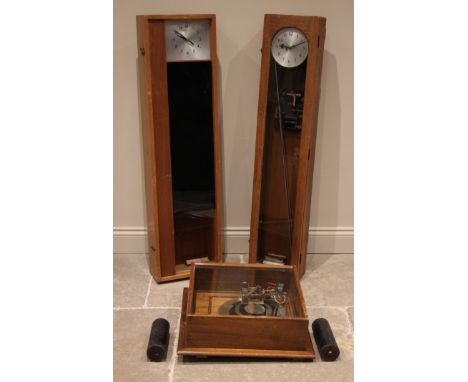 An oak cased electric Synchronome master clock, mid 20th century, serial no. 1091, with time and day dial/indicator, glazed c