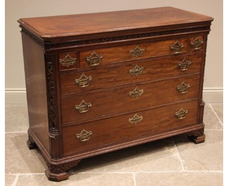 An early 19th century mahogany vanity/dressing chest, in the manner of Gillows, the rectangular cross banded top with canted 