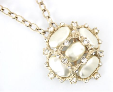 A Chanel paste pearl and paste set necklace, the circular pendant set with five baroque shaped paste pearls interspersed with
