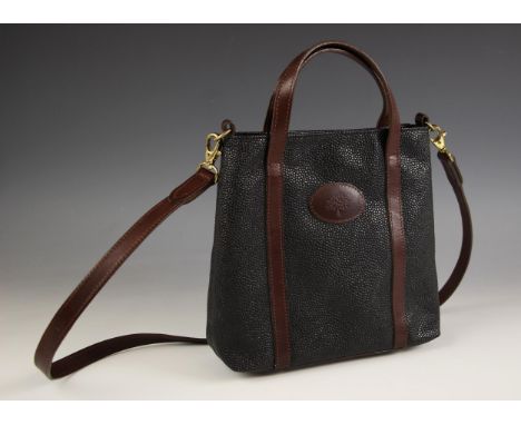 A Mulberry scotch grain black leather handbag, with brown trim, detachable cross body strap, gold tone hardware, tartan linin