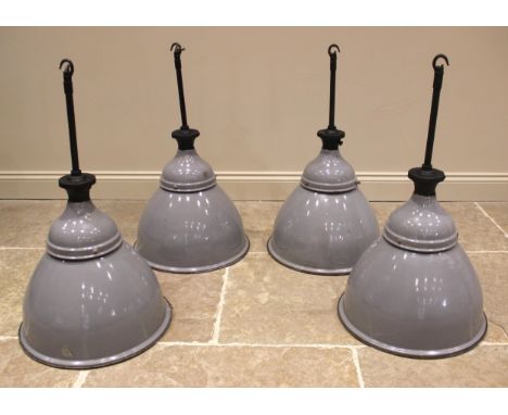 A set of four vintage Benjamin enamelled pendant industrial lamps, mid 20th century, each with a painted iron hanging rod sup