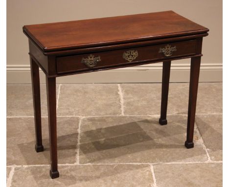 A George III mahogany tea table, the rectangular hinged and moulded top, over a single long frieze oak lined drawer, applied 