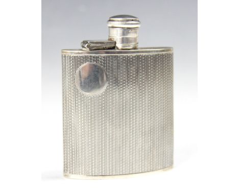 A George V silver hipflask, William Base & Sons, Birmingham 1928, of rectangular convex form with bayonet top and with all-ov