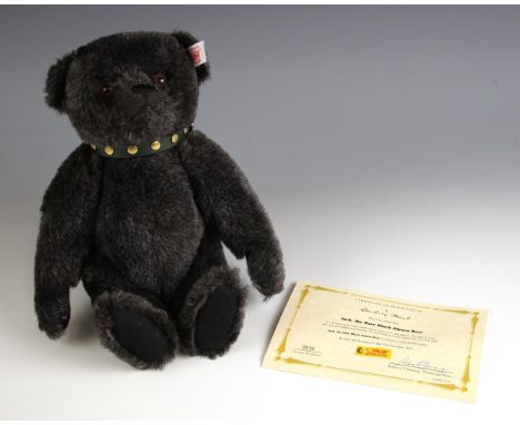 A Steiff limited edition 'Jack, the Rare Black Alpaca Bear', white ear tag, card jointed, with certificate, with dust bag, 25