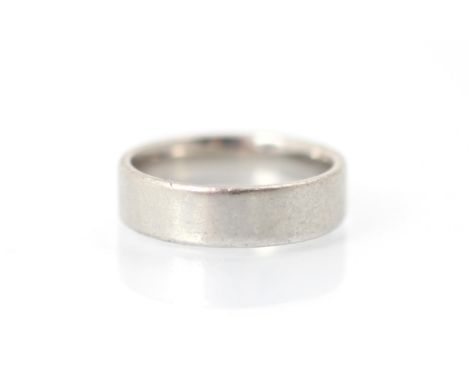 A palladium wedding band, stamped 'Pd 950', ring size R, 7gms 