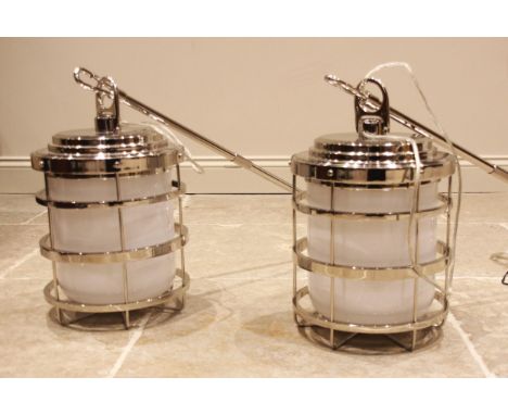 A pair of Ralph Lauren blue label New York chromed pendant ships lanterns, each with impressed maker's mark, with original re