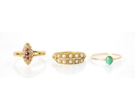 A selection of three rings, including an 18ct yellow gold split pearl example, the double row of pearls with carved shoulders