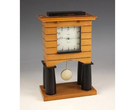 A maple and ebonised mantel clock, designed by Michael Graves, for Alessi, late 20th century, the 7cm square white dial appli