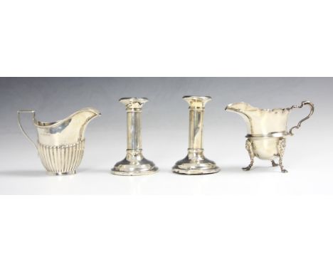 A selection of silver items, to include; a pair of short candlesticks A J Pepper &amp; Co Ltd, Birmingham 1918 and 1919, load