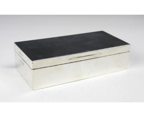 A George VI silver cigarette box, Padgett and Braham Ltd, London 1937, the hinged cover with engine turned and monogram detai