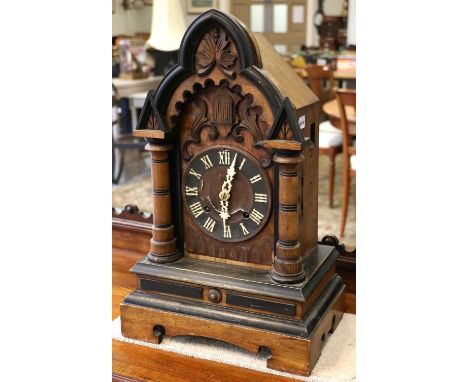 A Cuckoo Table Clock, circa 1900, movement stamped Junghans, 54cm highThe case surfaces are faded in parts, below the dial wi