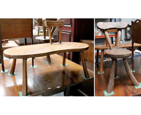 A Jack Grimble of Cromer Burr Elm Bench, single back support, kidney-shape set, four outswept faceted legs, 107cm; together w