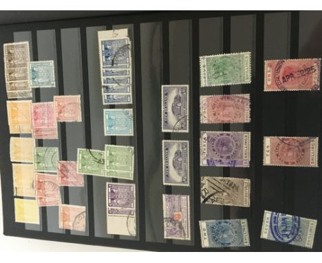 Two boxes containing a quantity of Australian and New Zealand stamps in albums and well presented Victorian and later both us