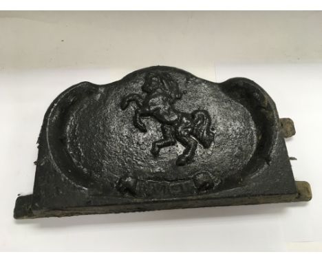 British transport interest. An Invicta cast iron name plate for a steam roller or engine, a signed oil on canvas of a 1925 Lo