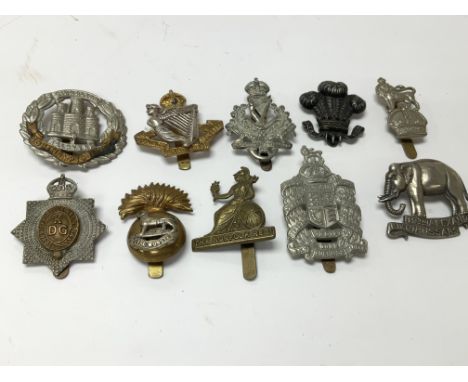 10 British army cap badges.