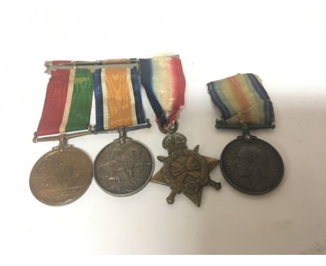 A Group of I world war medals awarded to Lieutenant S Sydney Wilkinson R.N.R with a vase containing albums of history and rel