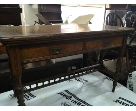 A Quality Victorian side table with a pollard oak top above two drawers with turned legs and under stretchers.