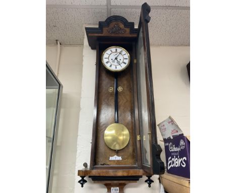 Walnut and ebonized regular wall clock